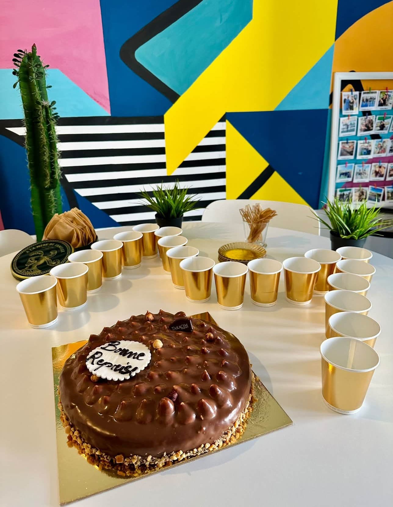 A convivial moment to celebrate a colleague’s return — Image 2 of 4