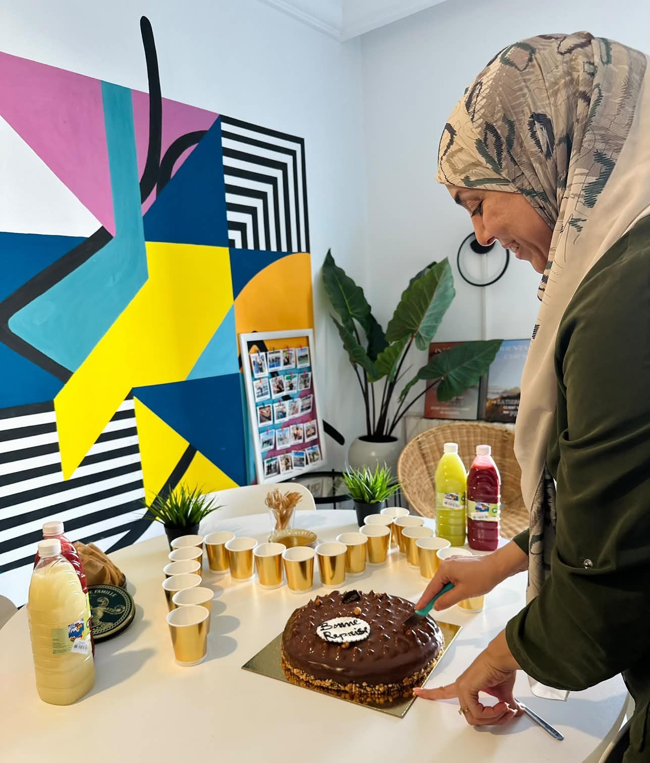 A convivial moment to celebrate a colleague’s return — Image 1 of 4
